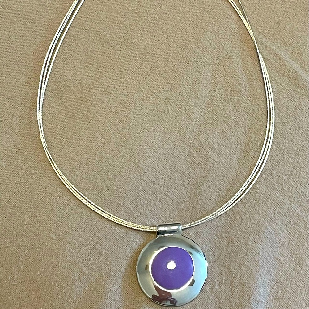 Silver tone necklace with light purple pendant
